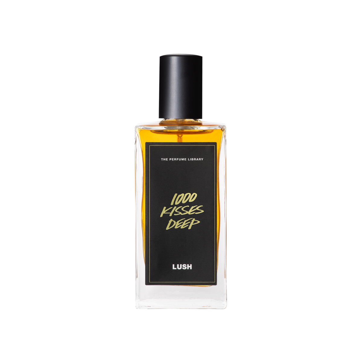 A glass perfume bottle filled with amber liquid. A black label reads 'The Perfume Library' and '1000 Kisses Deep'.